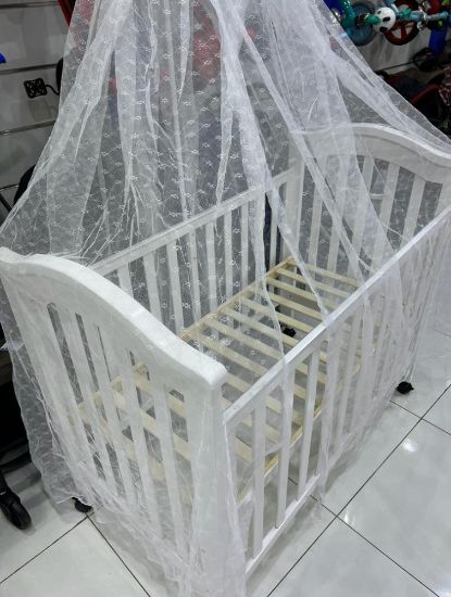 صورة سرير اطفال خشب